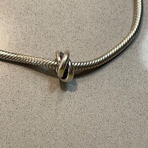 Silver three twist charm